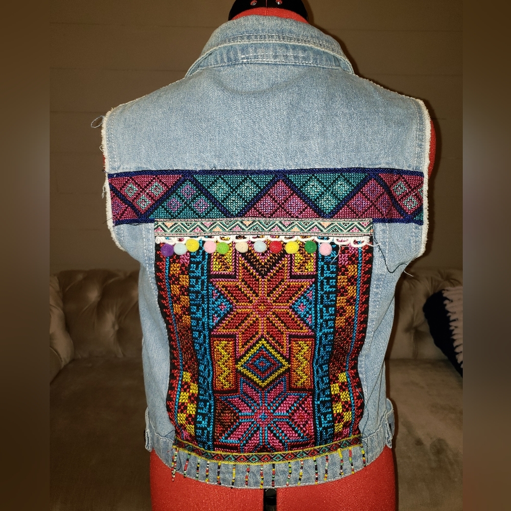 Colorful cross stitched denim vest
